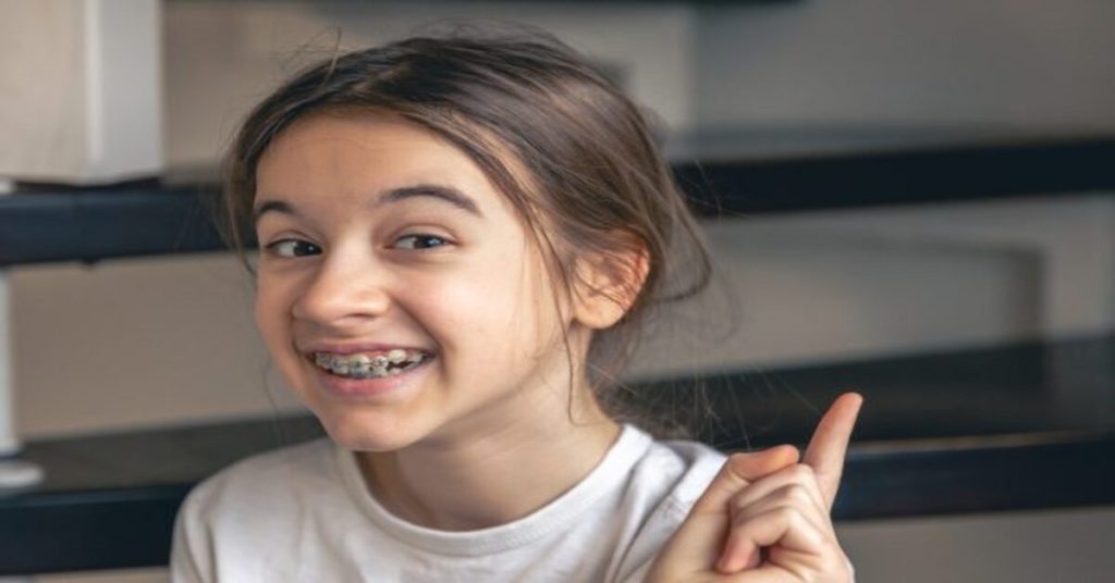 At what age should orthodontic treatment begin?